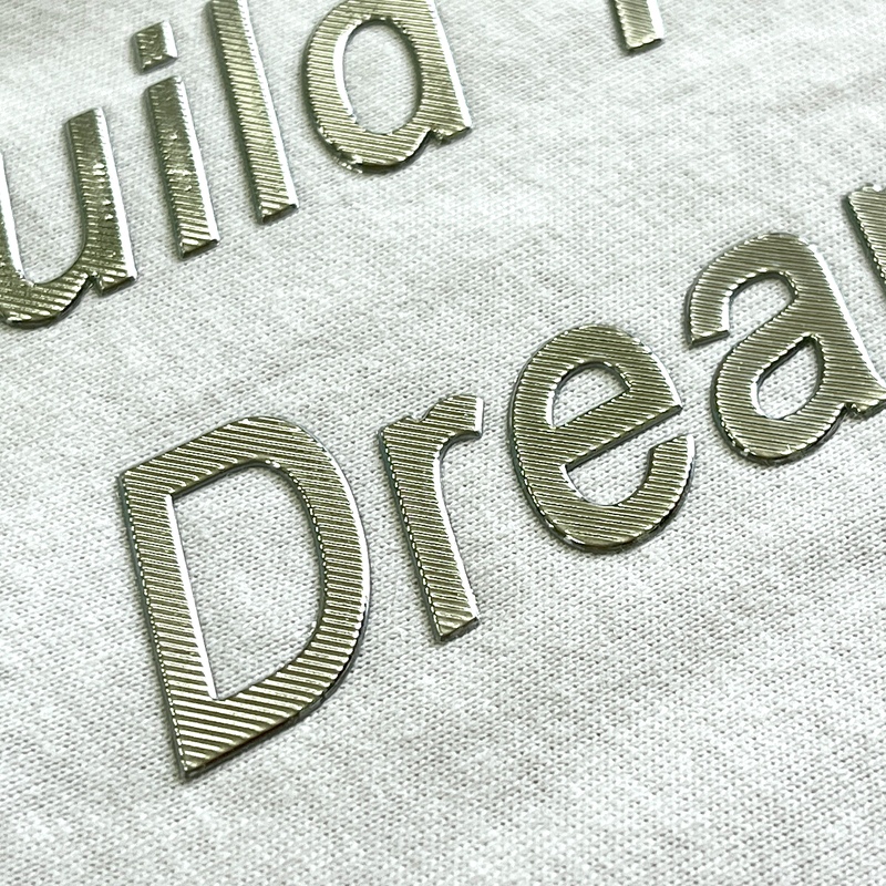 Striped-pattern Gold Letters Embossed Badge