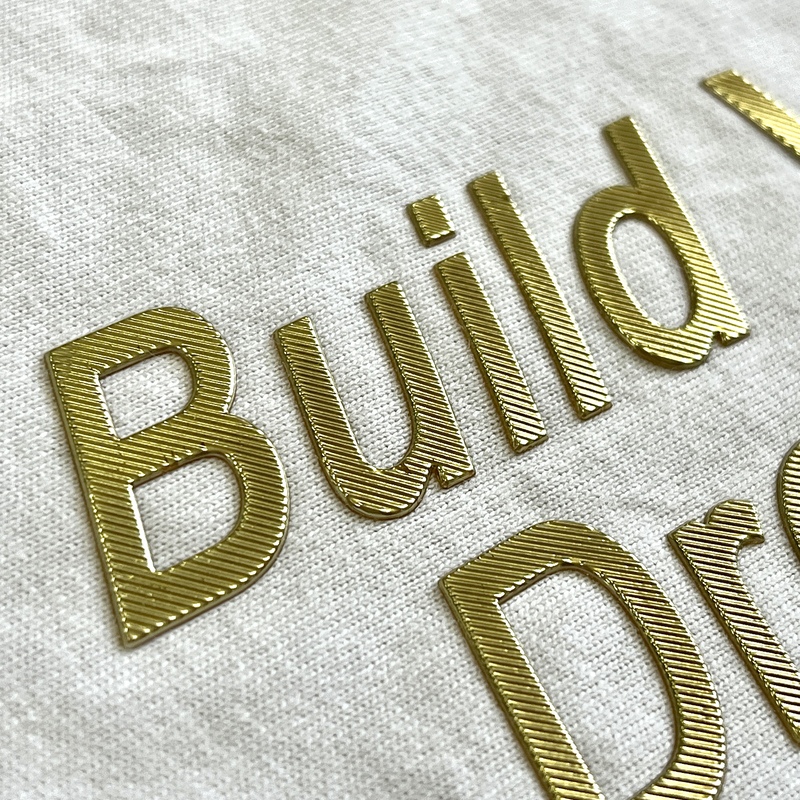 Metallic Gold Embossed Letters Iron - on Badge