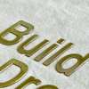 Metallic Gold Embossed Letters Iron - on Badge