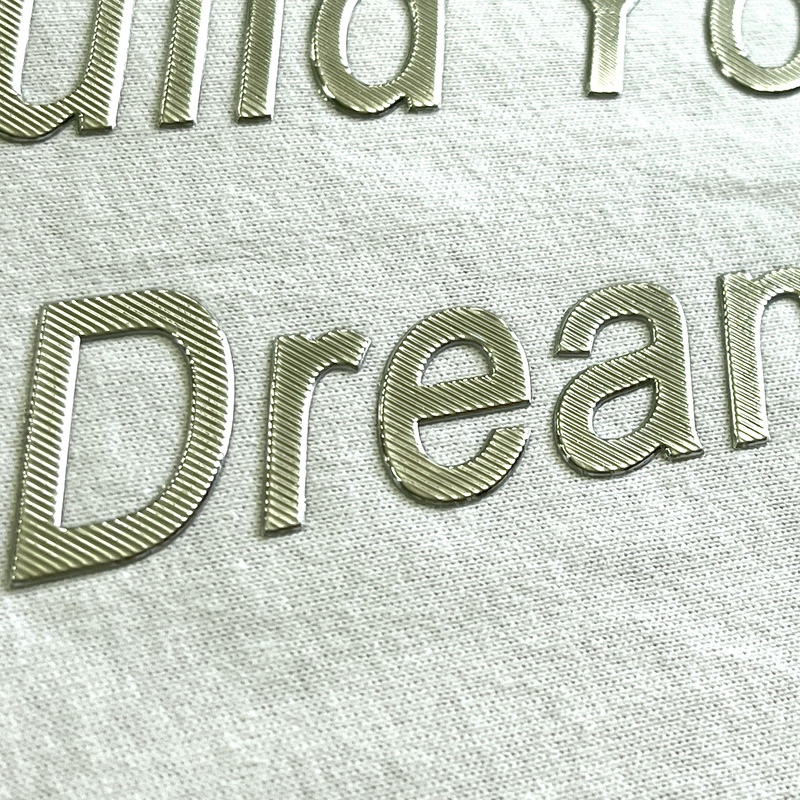Striped-pattern Gold Letters Embossed Badge