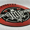 Retro-style Circular Embossed Badge