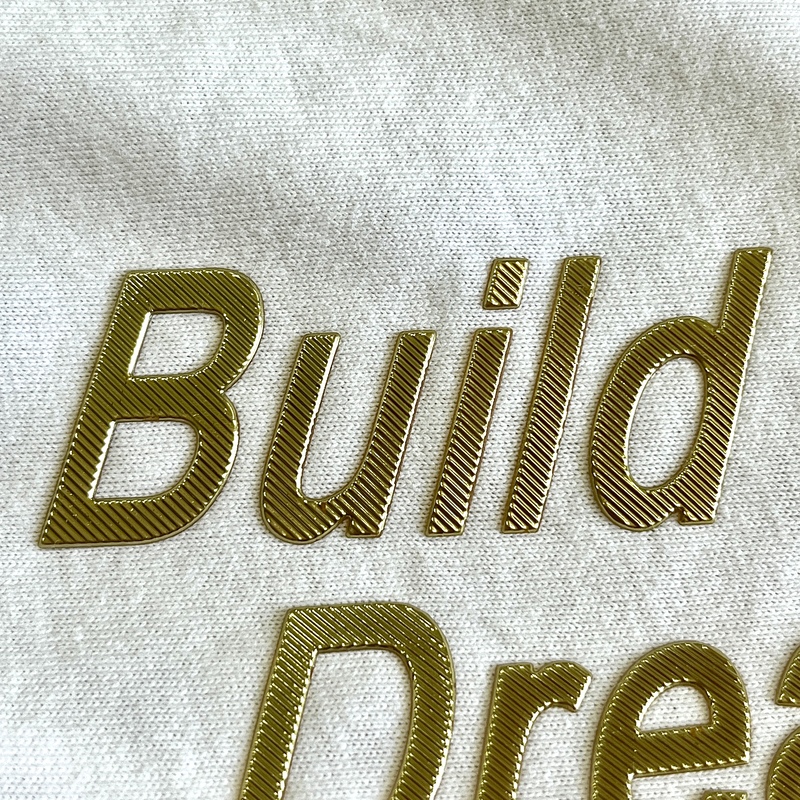 Metallic Gold Embossed Letters Iron - on Badge