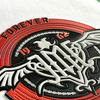 Retro-style Circular Embossed Badge