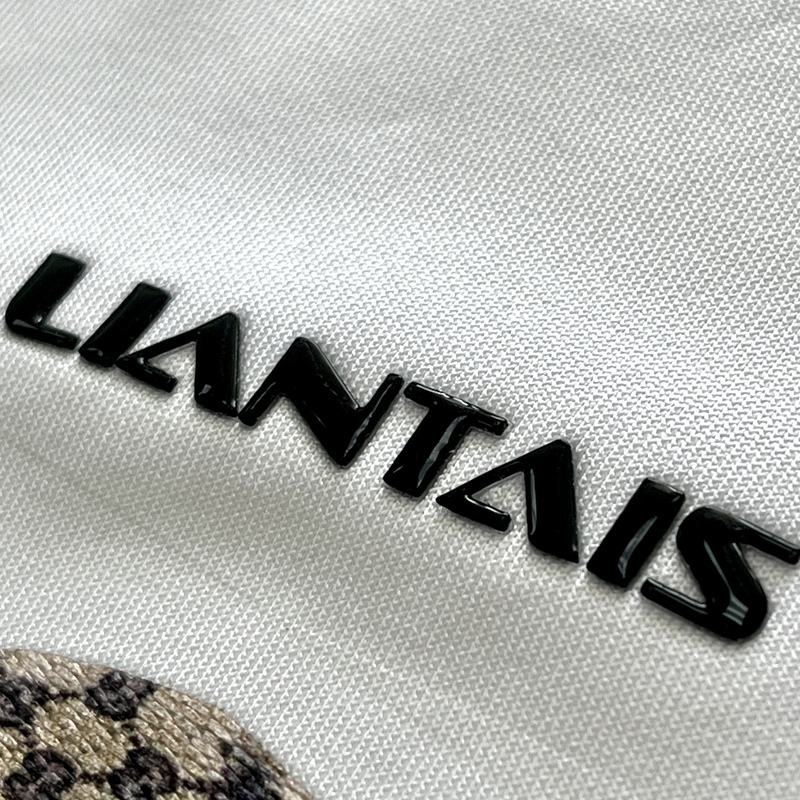 3D Black Jelly Rubber Silicone Patches with Raised Letters Iron-on Logo Badges for Sportswear Teamwear Uniform Bags