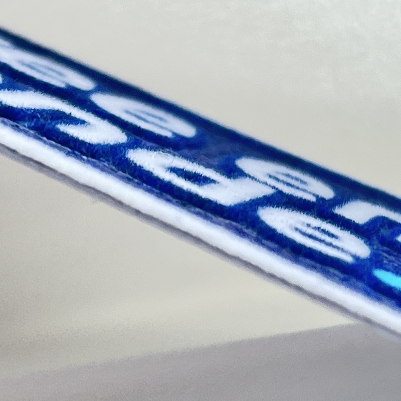 Blue And White Text-only Flock And Tatami Fabric Badge