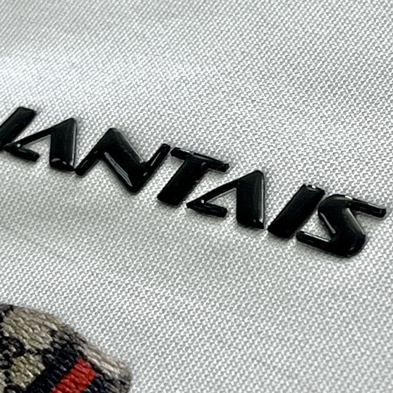 3D Black Jelly Rubber Silicone Patches with Raised Letters Iron-on Logo Badges for Sportswear Teamwear Uniform Bags