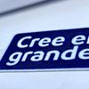 Blue And White Text-only Flock And Tatami Fabric Badge