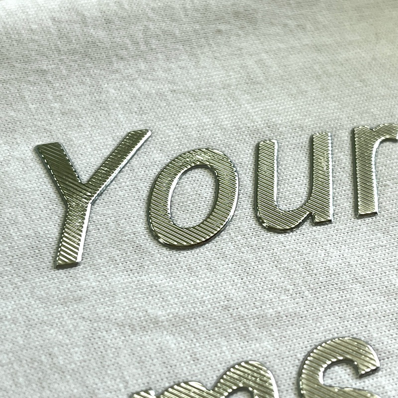 Striped-pattern Gold Letters Embossed Badge